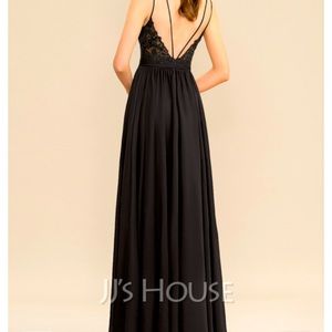 Long black prom/formal dress. Laced back with spaghetti strap